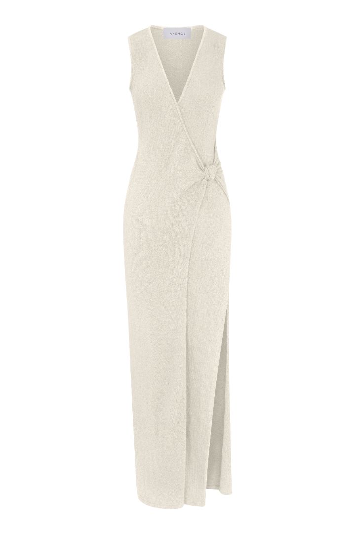 Plunging Knot Wrap Dress in crochet cotton knit featuring a wrap silhouette, knot detail, and plunging neckline in a lightweight textured fabric.