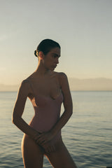 Model wearing the Balconette Underwire One-Piece, featuring underwire support, adjustable straps, and a clean, 90s-inspired silhouette.