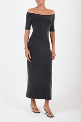 Ecomm Model wearing the Carolyn Off the Shoulder Midi Dress in Luxe Cupro Jersey, the graceful line of the neck continues to the shoulder and together with the elbow-length sleeve creating a moment of alluring and understated chic. 
