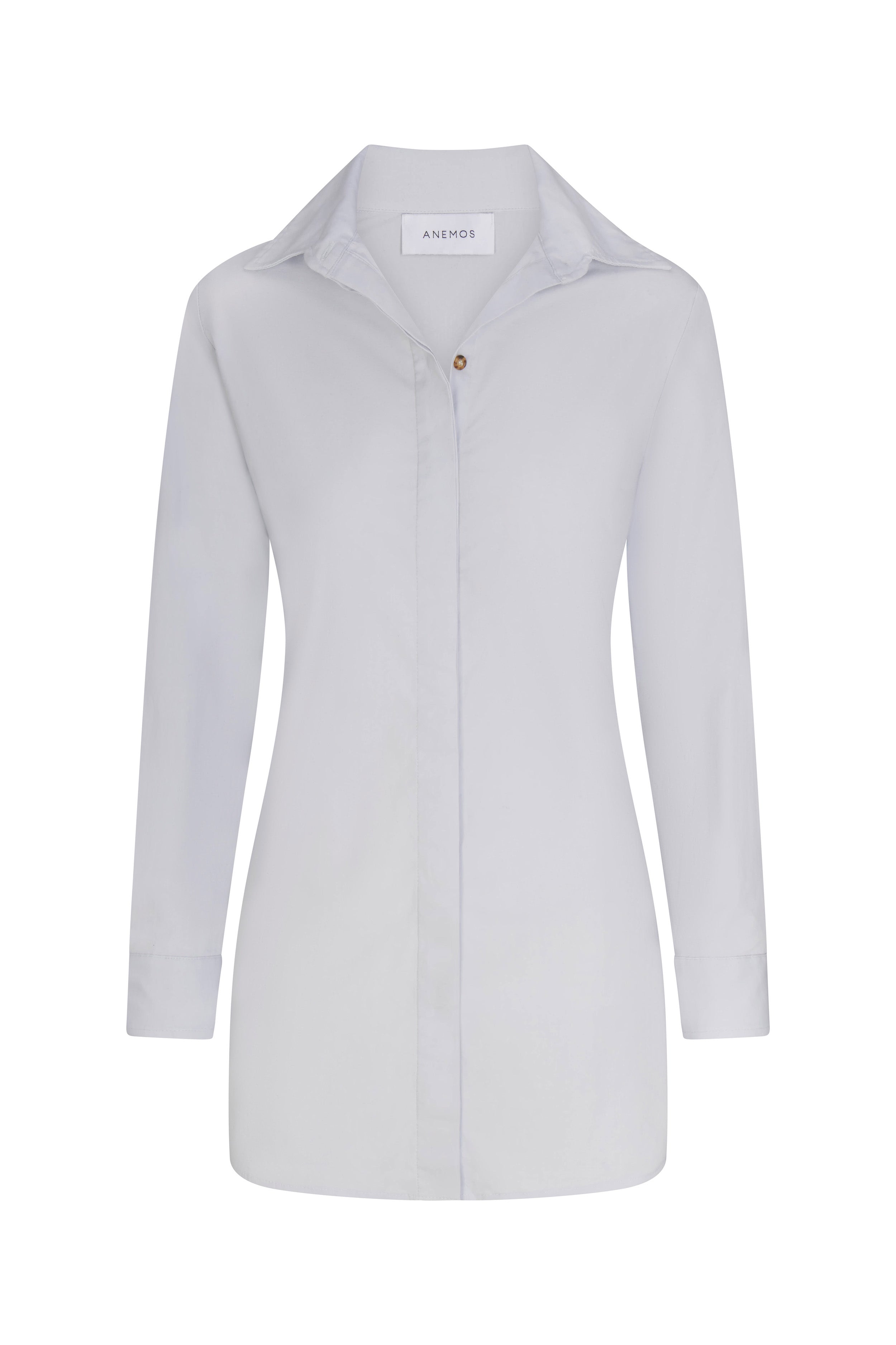 Collared mini dress in Italian stretch cotton featuring a classic button-down silhouette with a pointed collar, recycled tortoise shell buttons, and darted back detailing. An unlined, opaque mini dress designed for a structured yet comfortable fit.