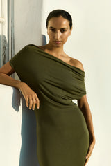 Model wearing the Cowl Neck Mini Dress Cypress Green in Compact Jersey which offers a perfect blend of structure and softness. It drapes beautifully while hugging the body in all the right places effortless, flattering, and easy to wear.