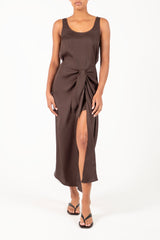 Ecomm Model wearing the D.K. Midi Wrap Dress in Matte Crepe, featuring a classic scoop neckline and self-tie skirt designed to be styled several ways.