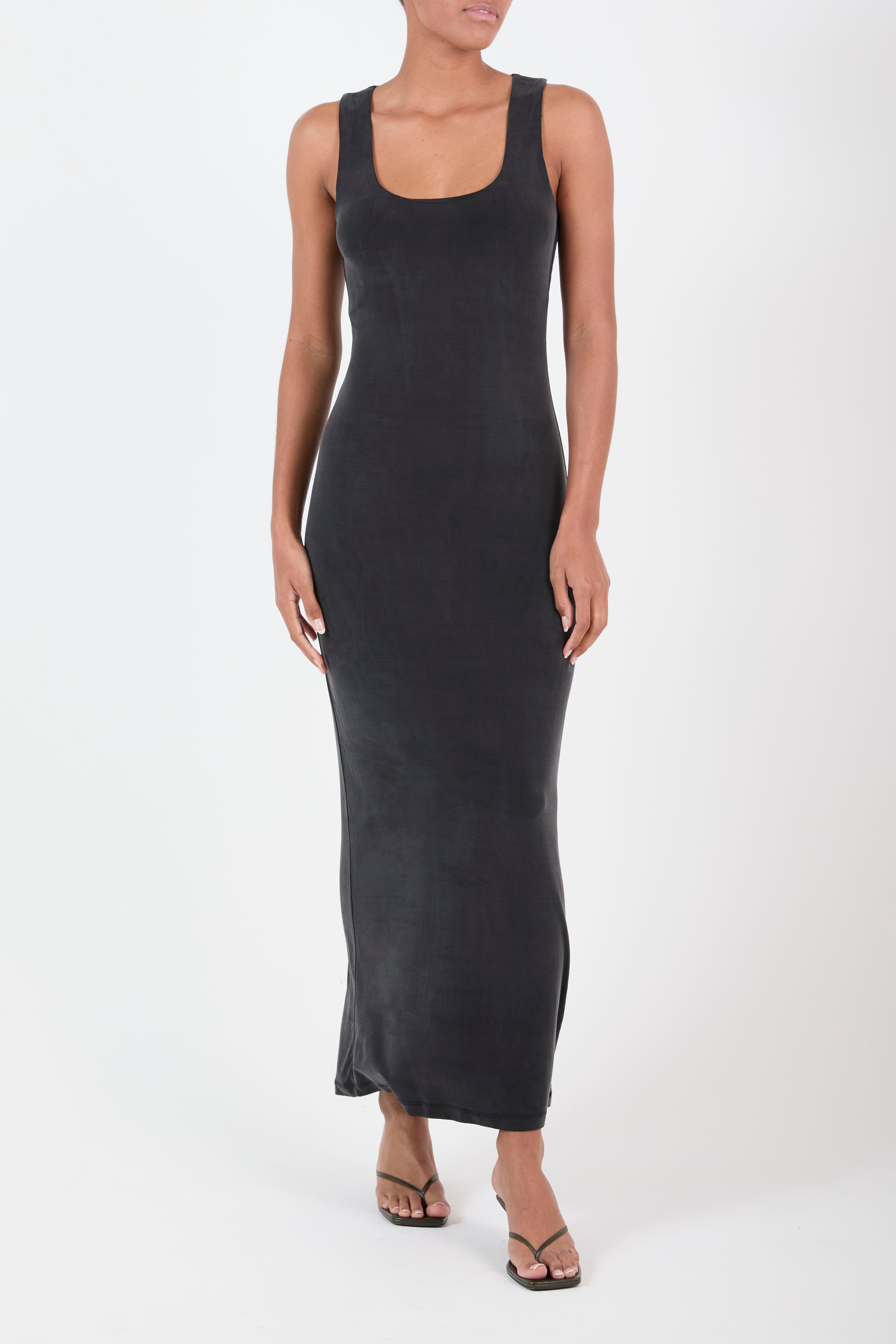 Ecomm Model wearing Hume Tank Maxi Dress in Luxe Cupro Jersey, a utilitarian attitude meets sophisticated sex appeal in this versatile summer piece, perfect for poolside or a beach soiree.