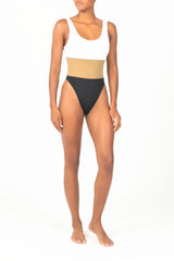 Ecomm Model wearing the Hume Tricolor One-Piece, featuring a dynamic high-cut, low-back design in two new tricolor styles.