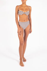 Ecomm Model wearing the Midi High-Cut Bikini Bottom In Espresso Even Stripes, featuring an easy rise and bold, sculpted sides that elongate the legs. 