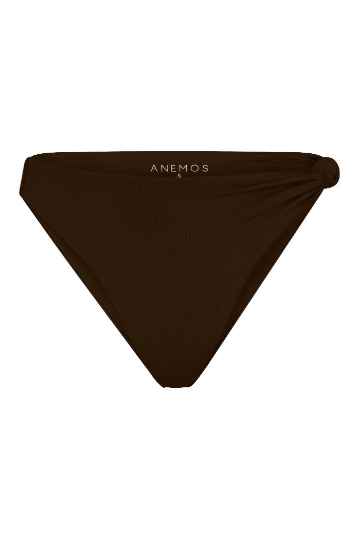 The Knot Asymmetric Midi Bikini Bottom on a white background, featuring a high-waist, high-cut leg, and knot detail at the hip for a retro-inspired, sculptural look. 
