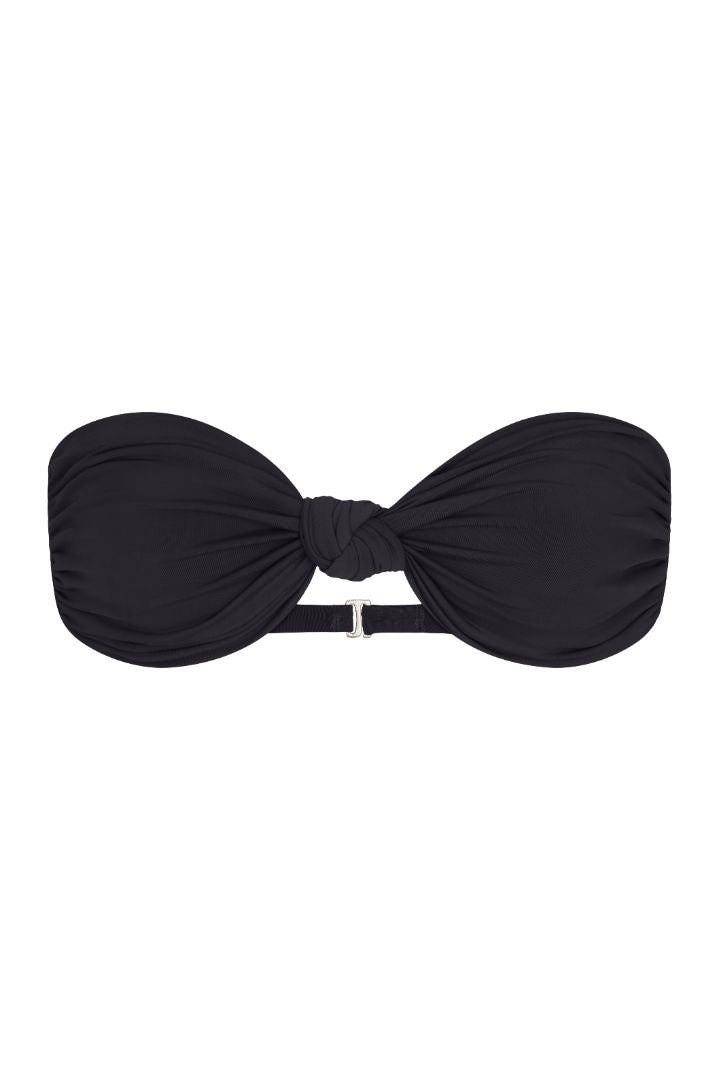 The Knot Bandeau Bikini Top on a white background, featuring a bandeau silhouette with a refined knot detail, blending ’70s glamour with ’90s simplicity. 