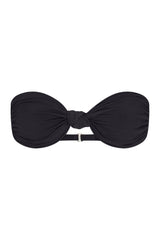 The Knot Bandeau Bikini Top on a white background, featuring a bandeau silhouette with a refined knot detail, blending ’70s glamour with ’90s simplicity. 