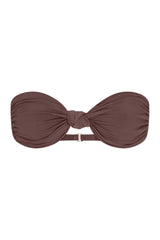 The Knot Bandeau Bikini Top on a white background, featuring a bandeau silhouette with a refined knot detail, blending ’70s glamour with ’90s simplicity. 