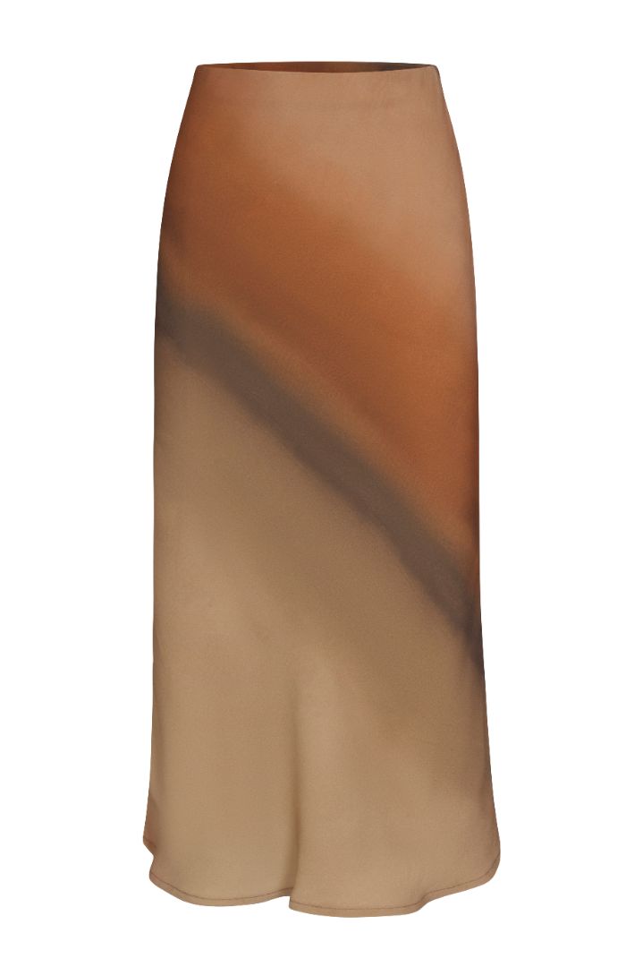 Rey Bias-Cut Skirt in red rock ombré satine crepe, featuring a fluid drape, bias-cut silhouette, and warm earth-tone gradient print.