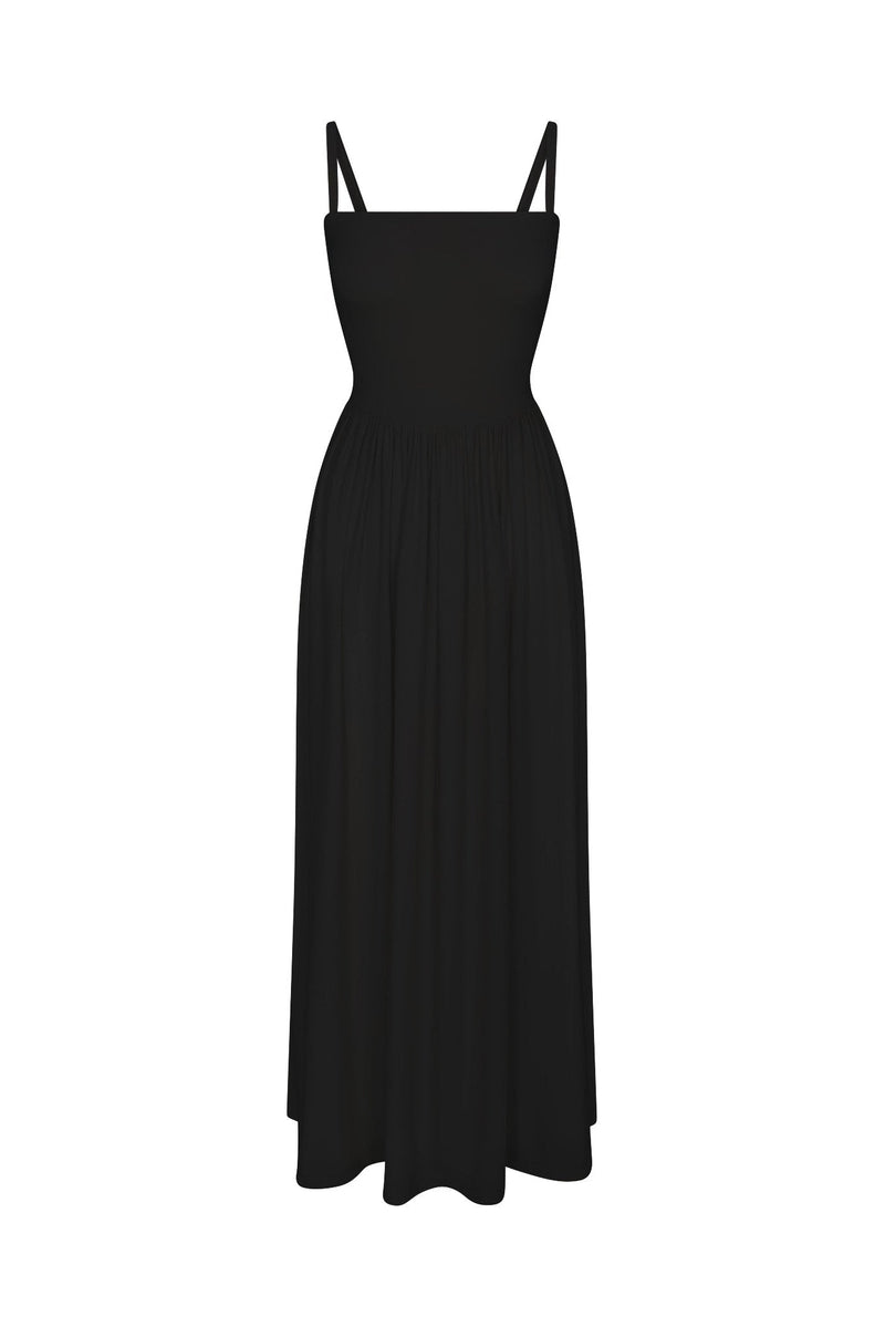 Square Neck Gathered A-Line Maxi Dress Black in compact jersey displayed on a white background. A flattering, minimalist and structured drape ideal for elevated everyday or resort wear.