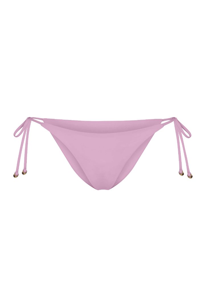 String Tie Bikini Bottom on a white background, featuring adjustable side ties with petite tortoise rings and a versatile high- or low-waist fit for a sleek ’70s-inspired look. 