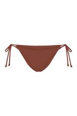 String Tie Bikini Bottom on a white background, featuring adjustable side ties with petite tortoise rings and a versatile high- or low-waist fit for a sleek ’70s-inspired look. 