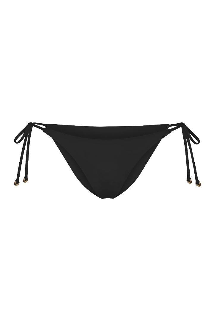 String Tie Bikini Bottom on a white background, featuring adjustable side ties with petite tortoise rings and a versatile high- or low-waist fit for a sleek ’70s-inspired look. 