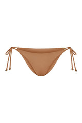 String Tie Bikini Bottom on a white background, featuring adjustable side ties with petite tortoise rings and a versatile high- or low-waist fit for a sleek ’70s-inspired look. 