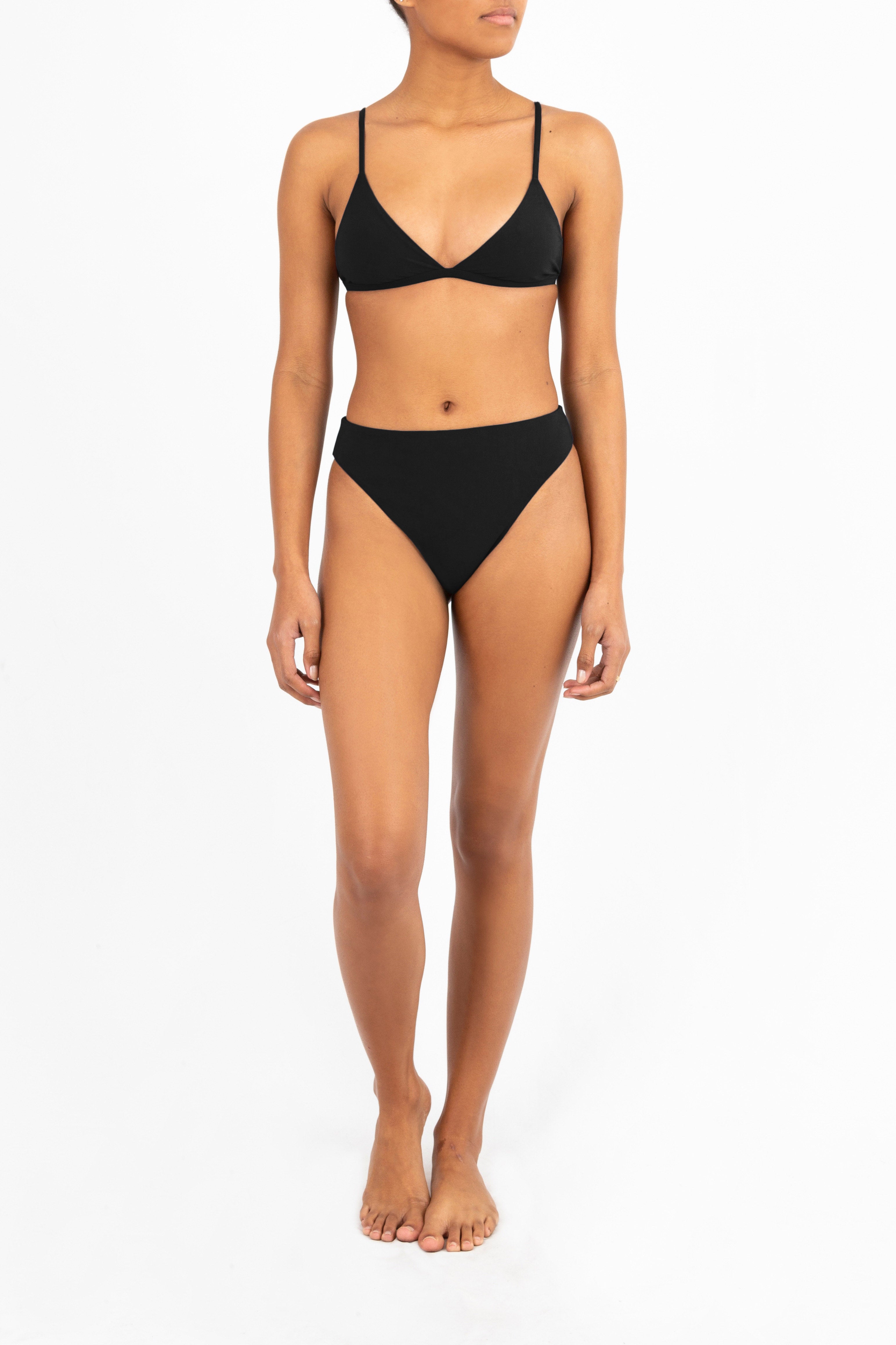 Model wearing the Classic Triangle Bikini Top, featuring a wide-cut silhouette with a banded bottom and slim straps, giving a fresh twist to the timeless triangle style.