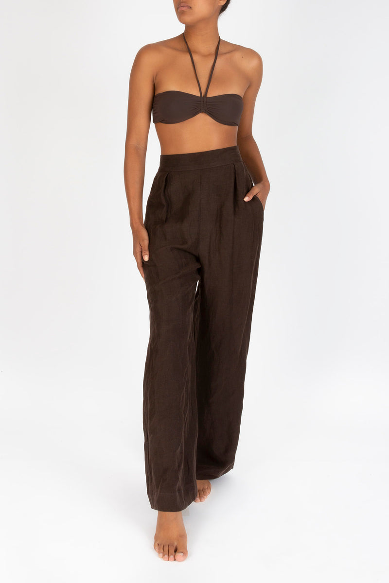 Ecomm Model wearing the Keaton Wide Leg Pant in Linen Cupro, offering a high-waisted, relaxed, and refined silhouette with soft pleating and luxe fabric perfect for warm weather.