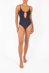 Ecomm Model wearing the Keyhole One-Piece, designed with an eye-catching keyhole cutout, is simplicity and daring all in one. 